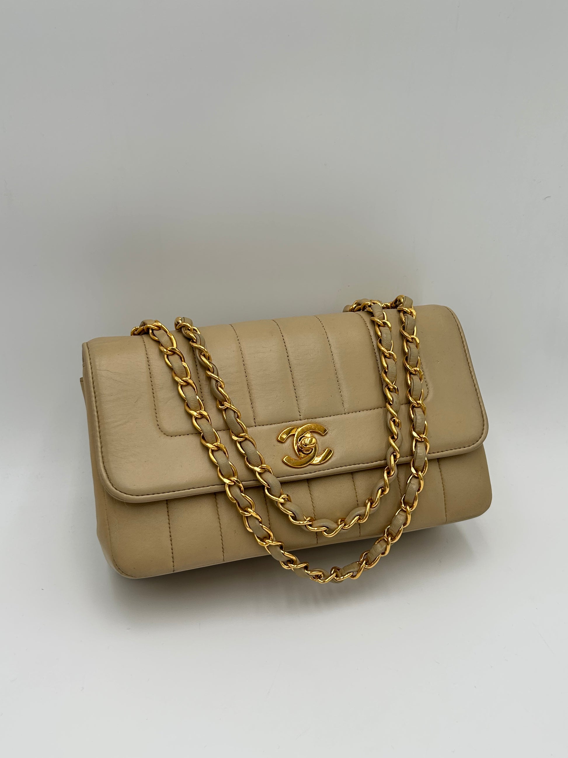 Chanel Mademoiselle Vertical Quilted Flap