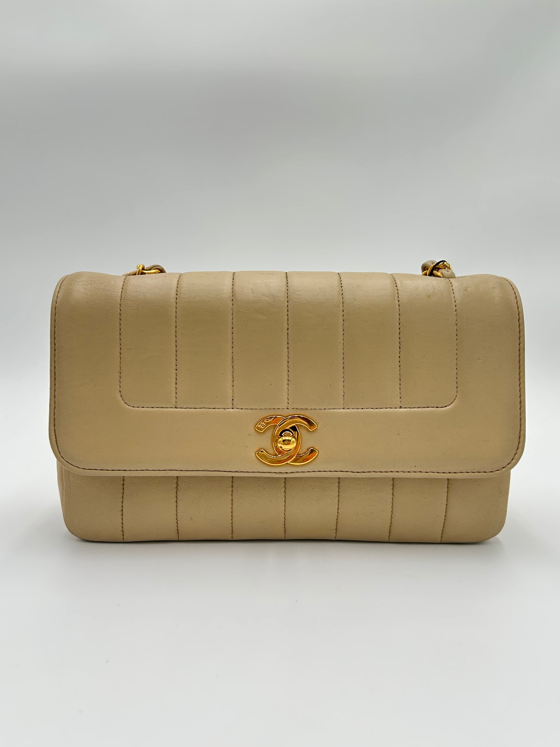 Chanel Mademoiselle Vertical Quilted Flap