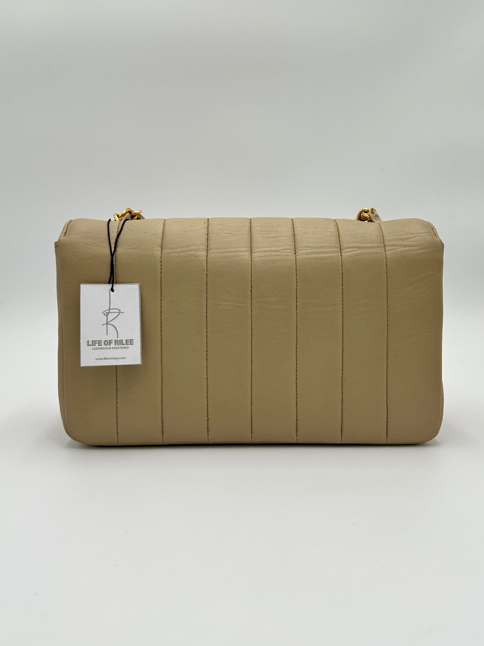 Chanel Mademoiselle Vertical Quilted Flap