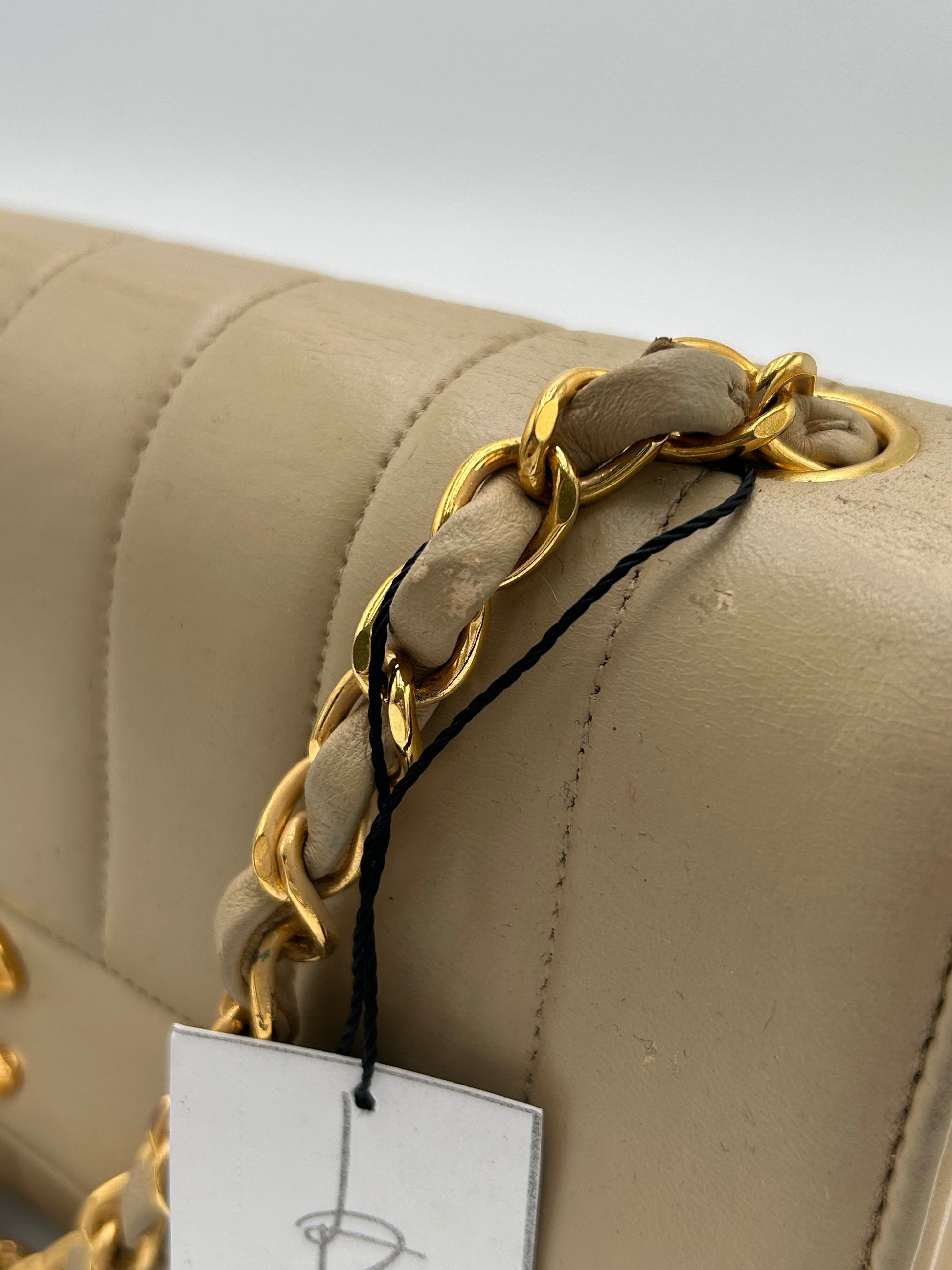 Chanel Mademoiselle Vertical Quilted Flap