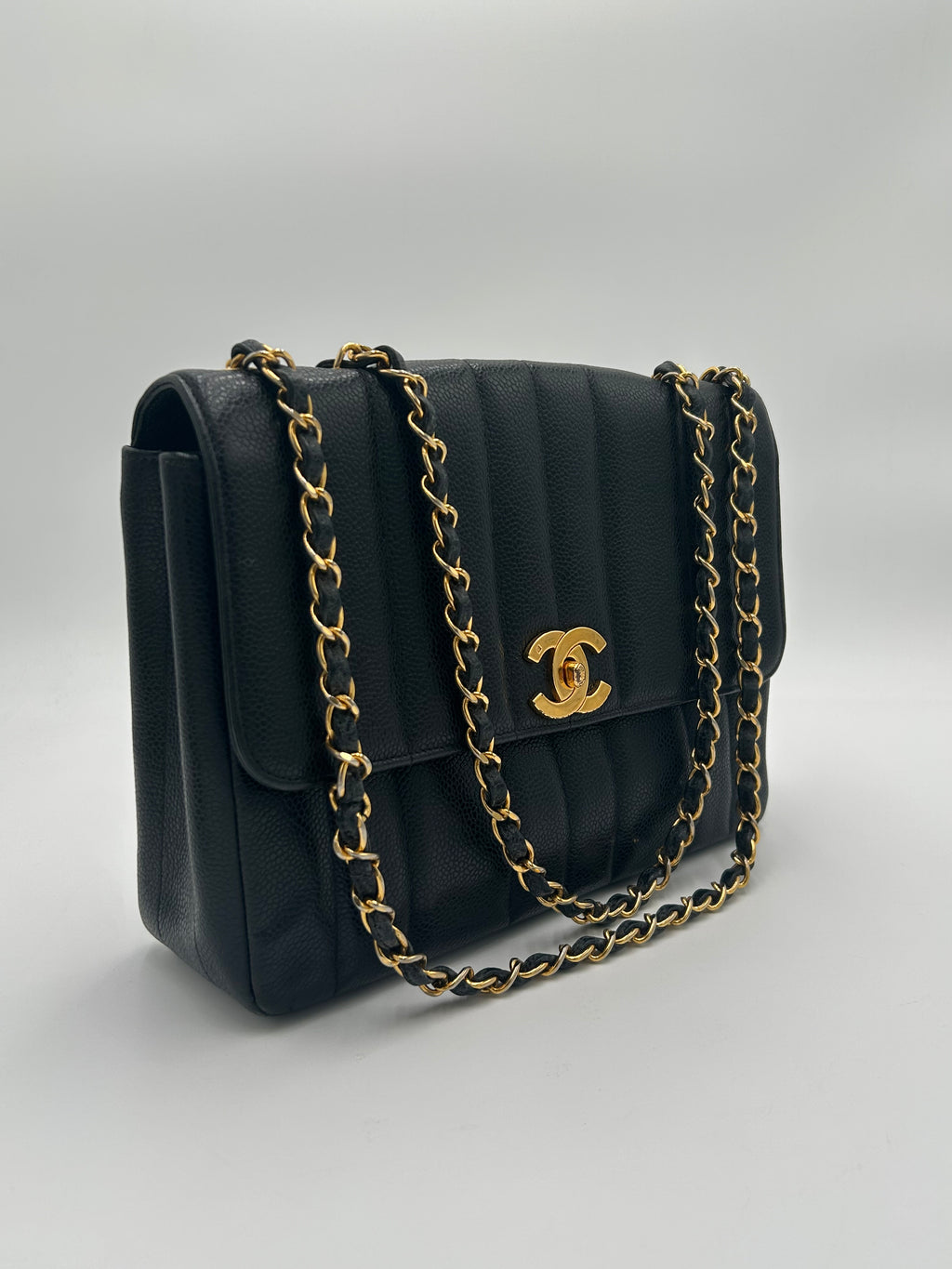 Chanel Vertical Quilted Flap