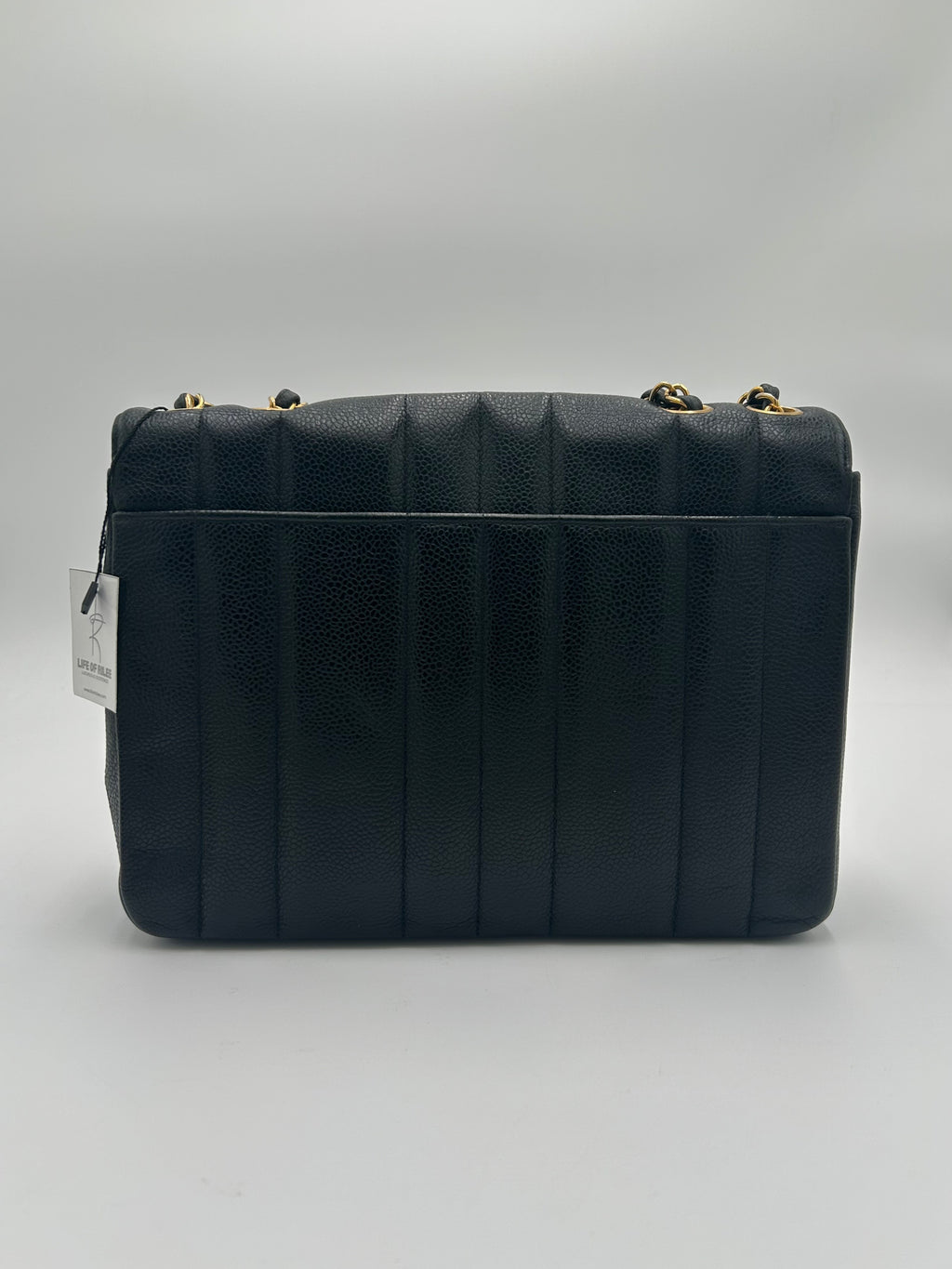 Chanel Vertical Quilted Flap