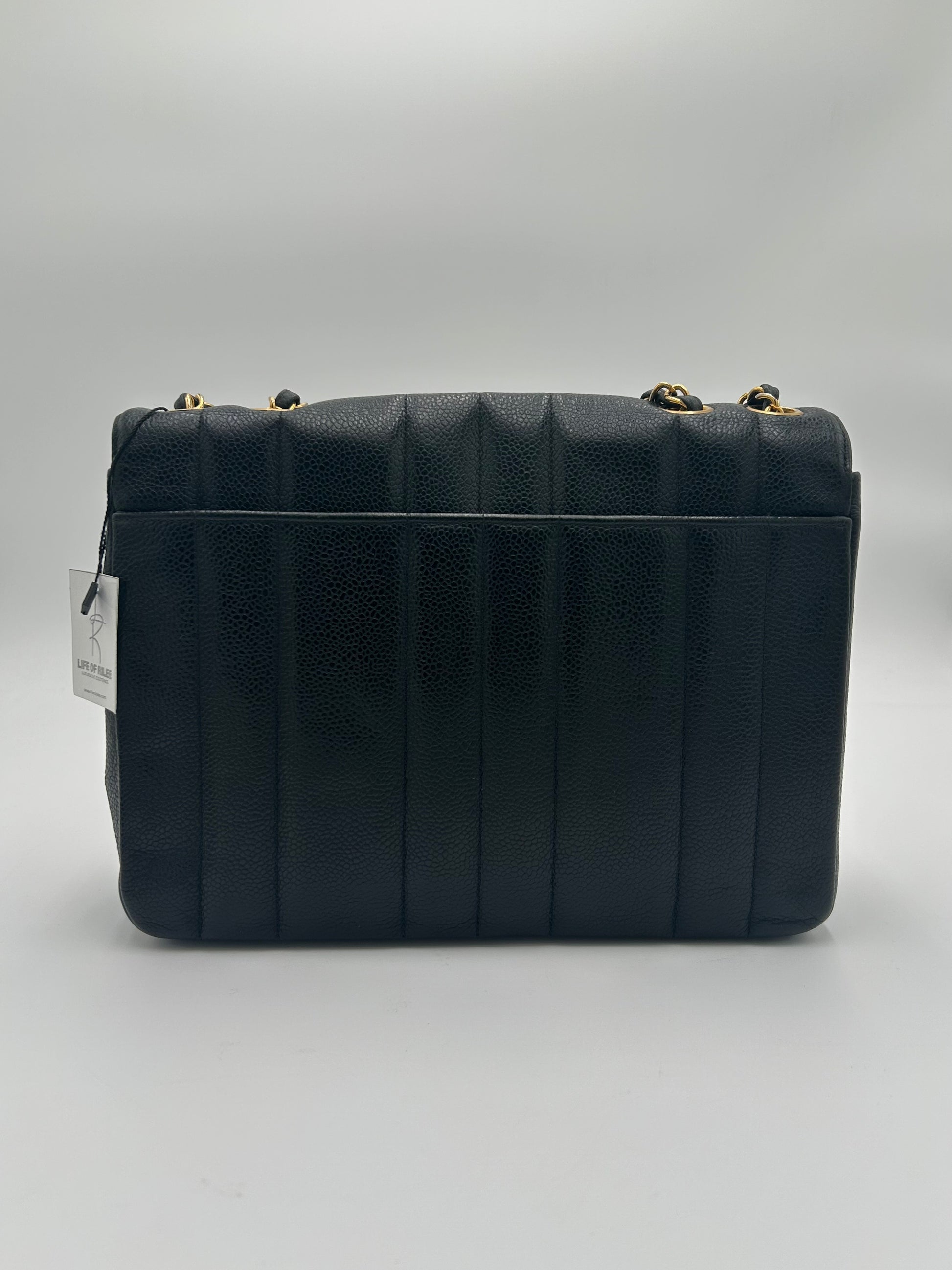 Chanel Vertical Quilted Flap