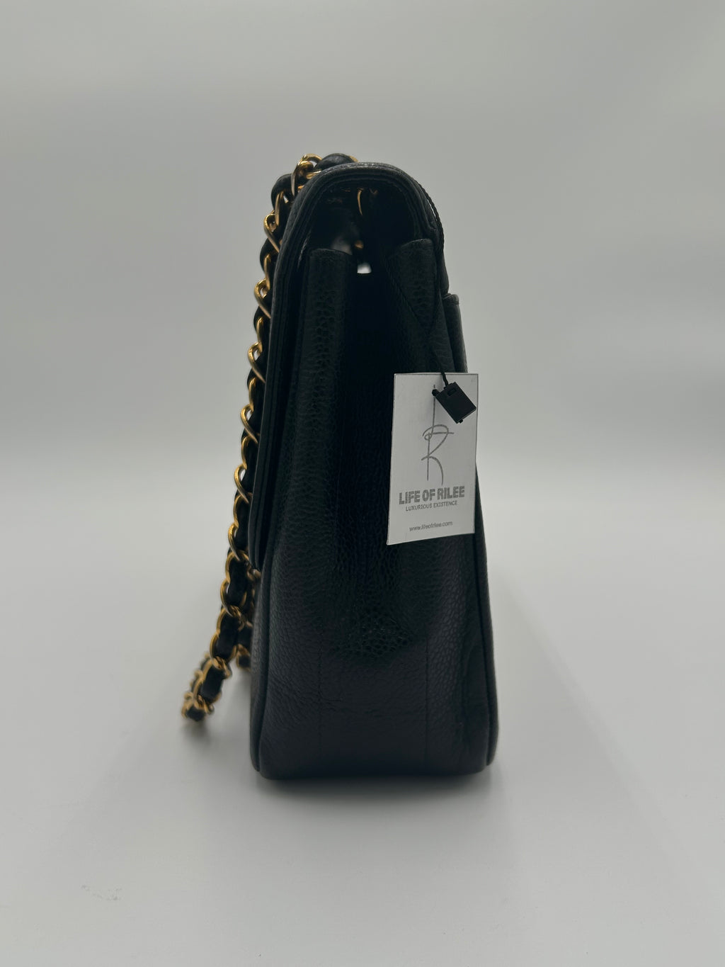 Chanel Vertical Quilted Flap