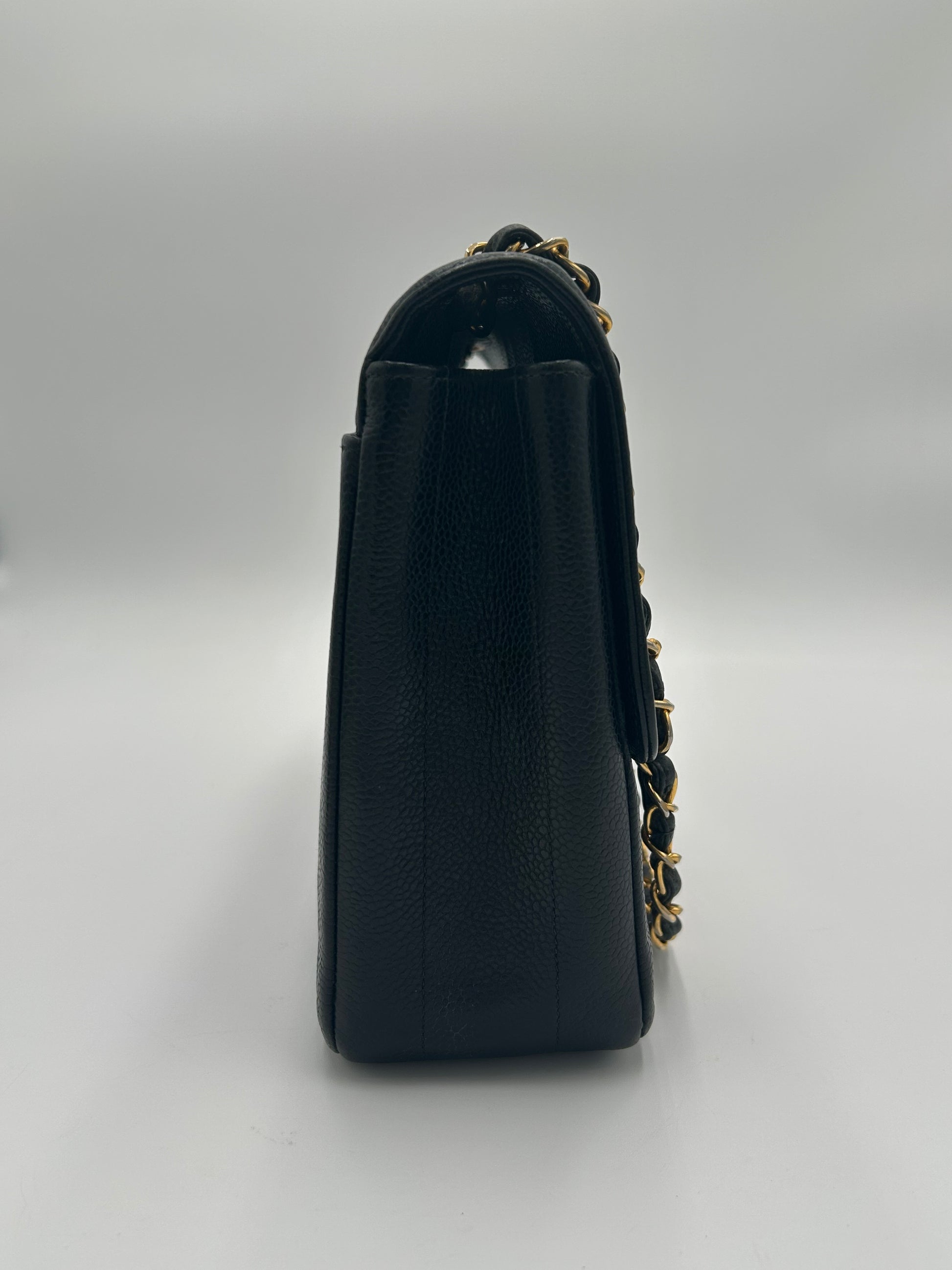 Chanel Vertical Quilted Flap