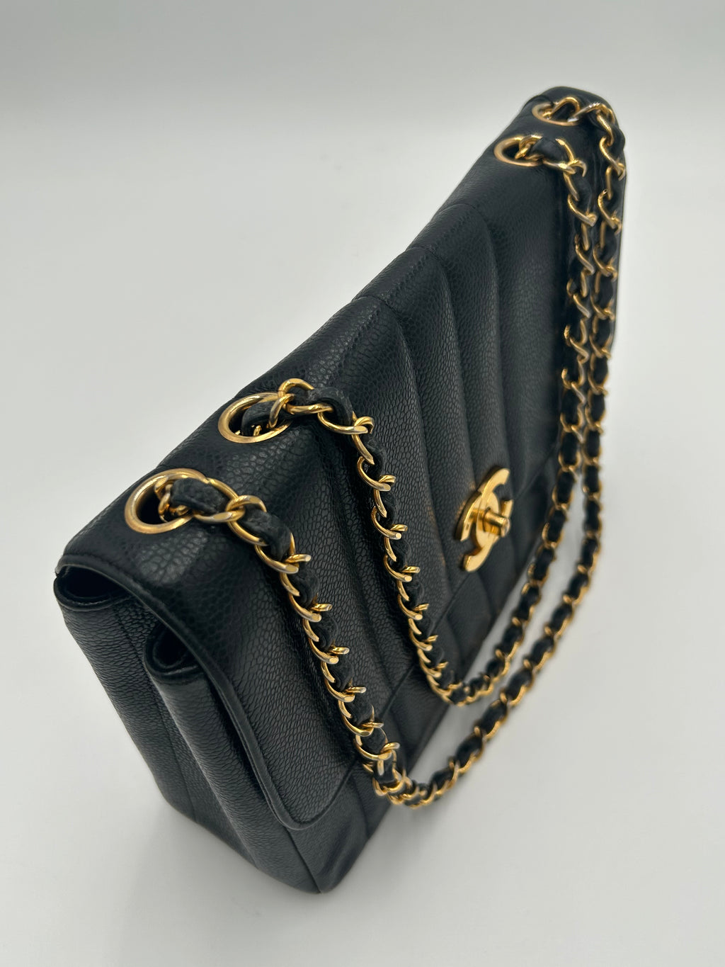 Chanel Vertical Quilted Flap