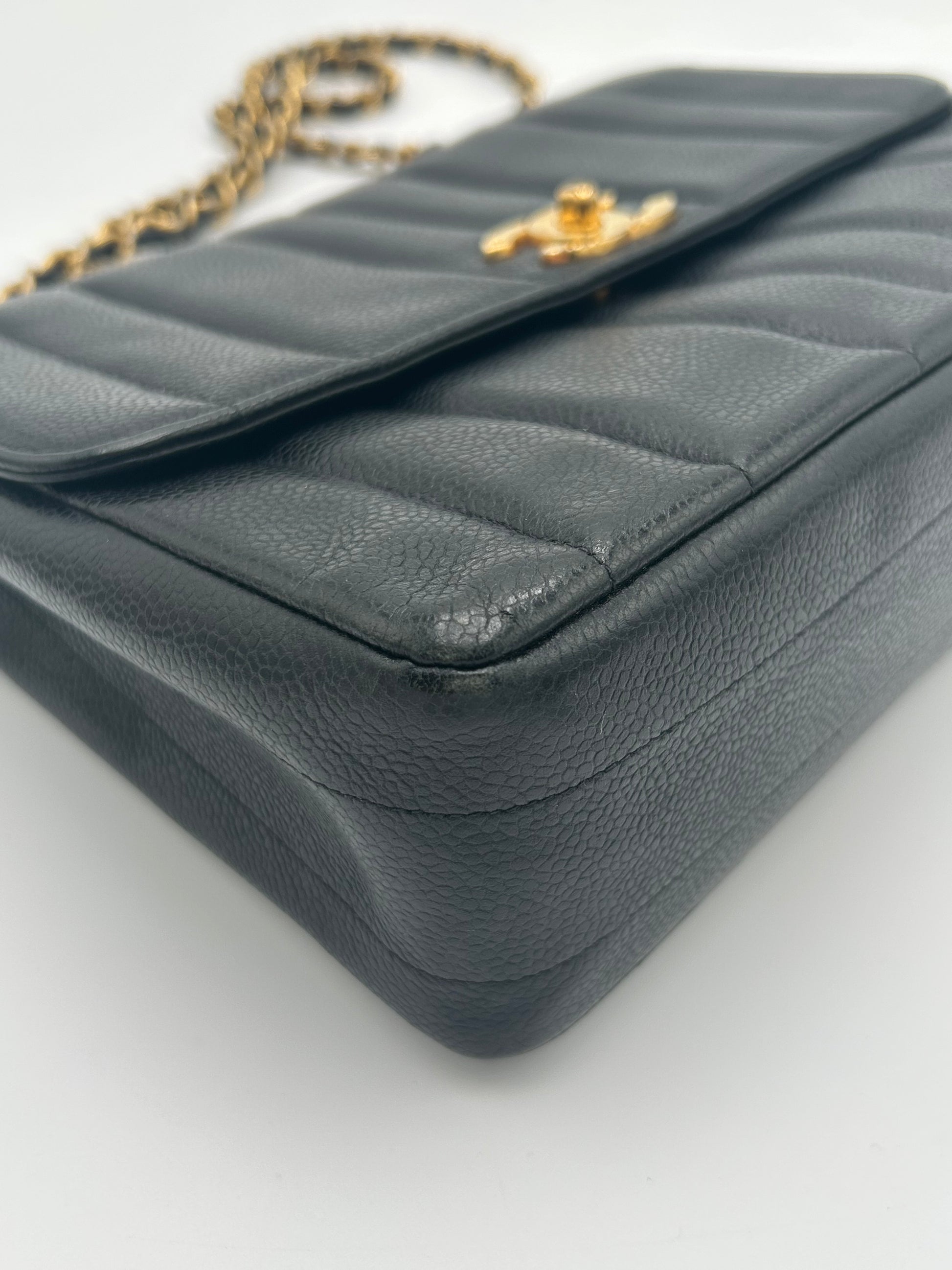 Chanel Vertical Quilted Flap