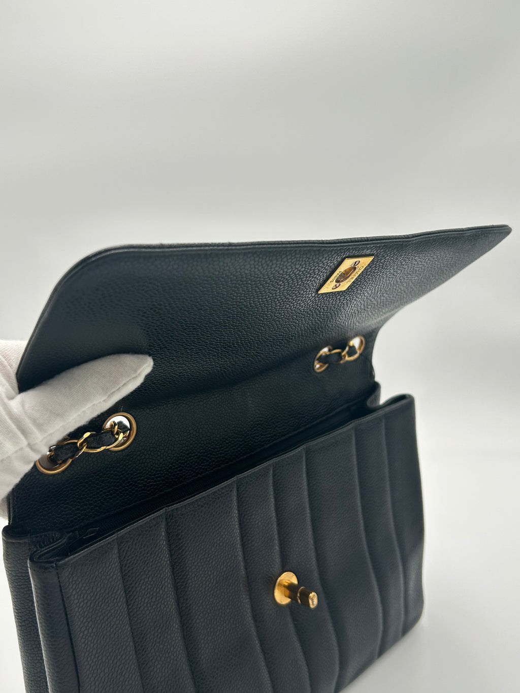 Chanel Vertical Quilted Flap