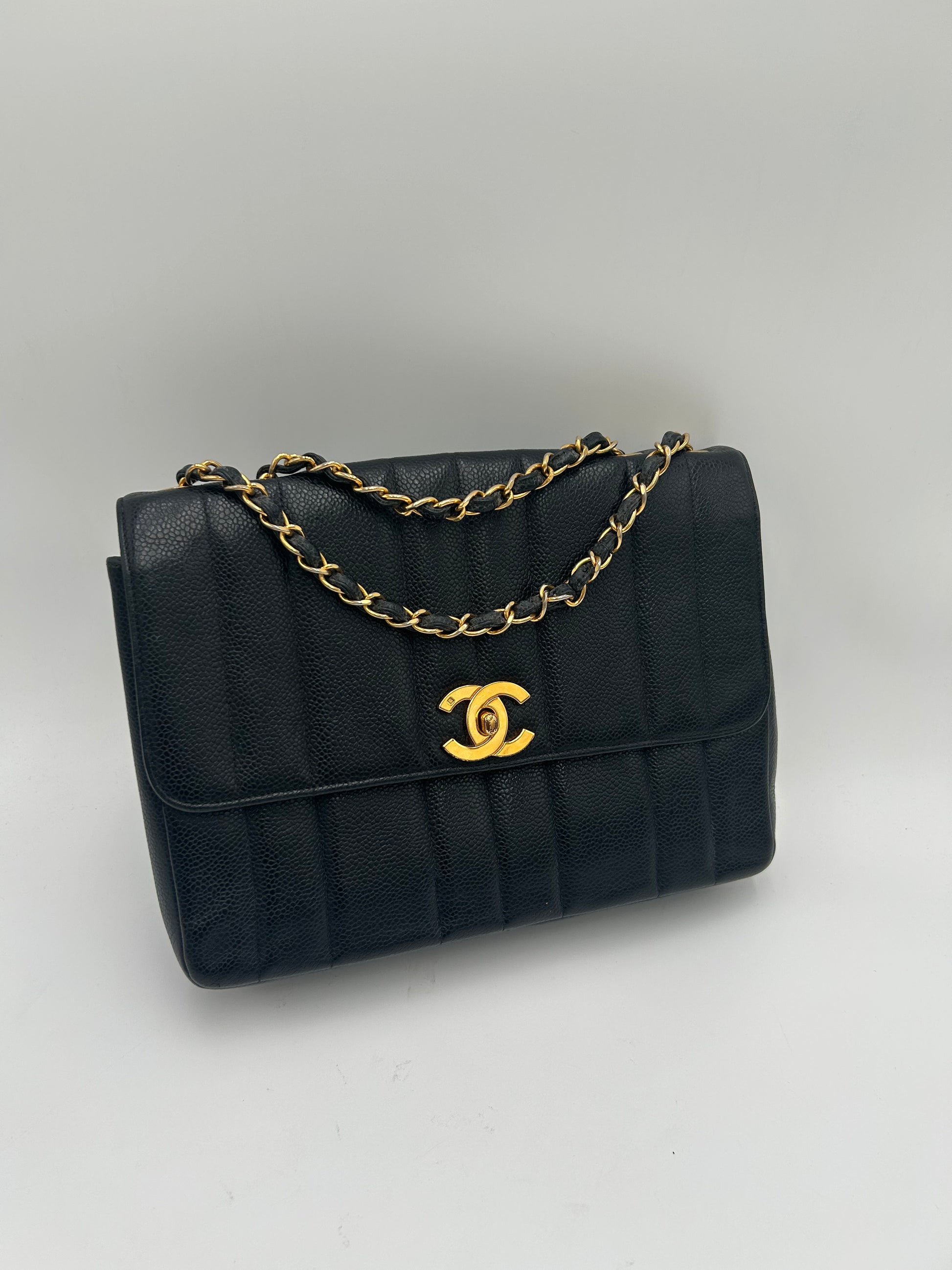 Chanel Vertical Quilted Flap